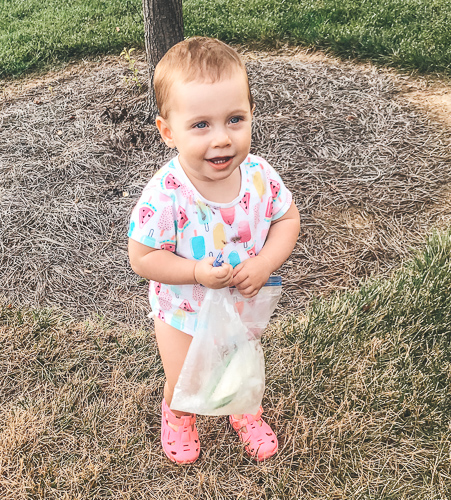 toddler making ice cream in a bag