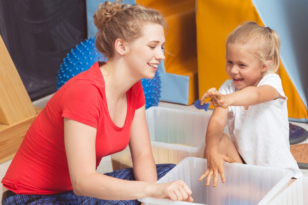 Toddler playing in sensory nook